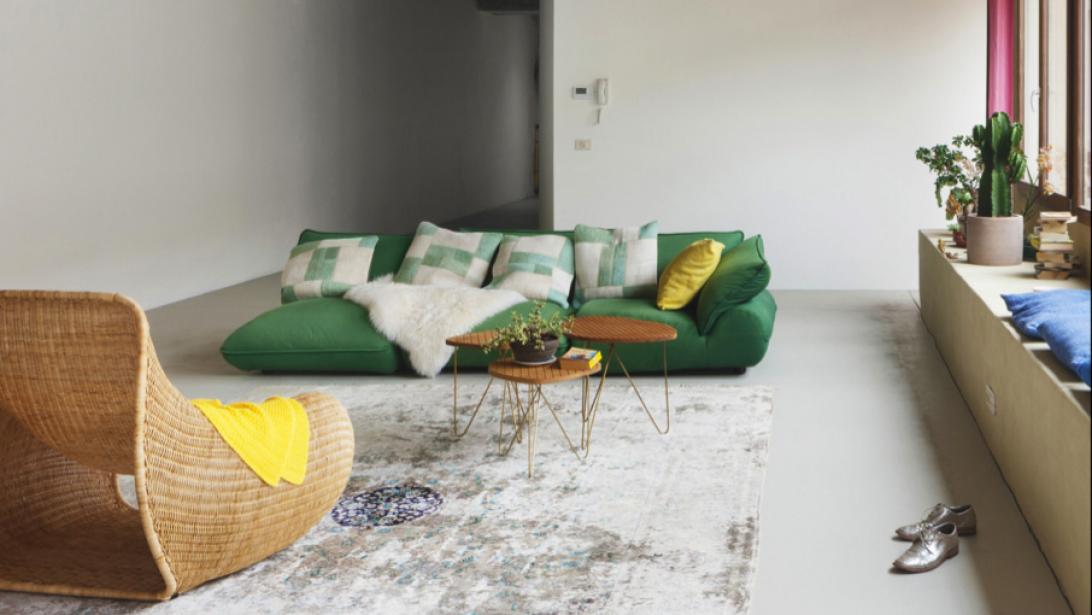 Binnenkijken: van industriële ruimte naar een warme loft Binnenkijken: van industriële ruimte naar een warme loft