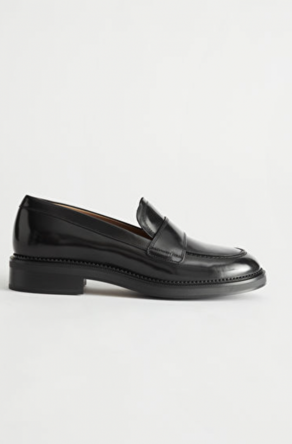 3. Zwarte loafers