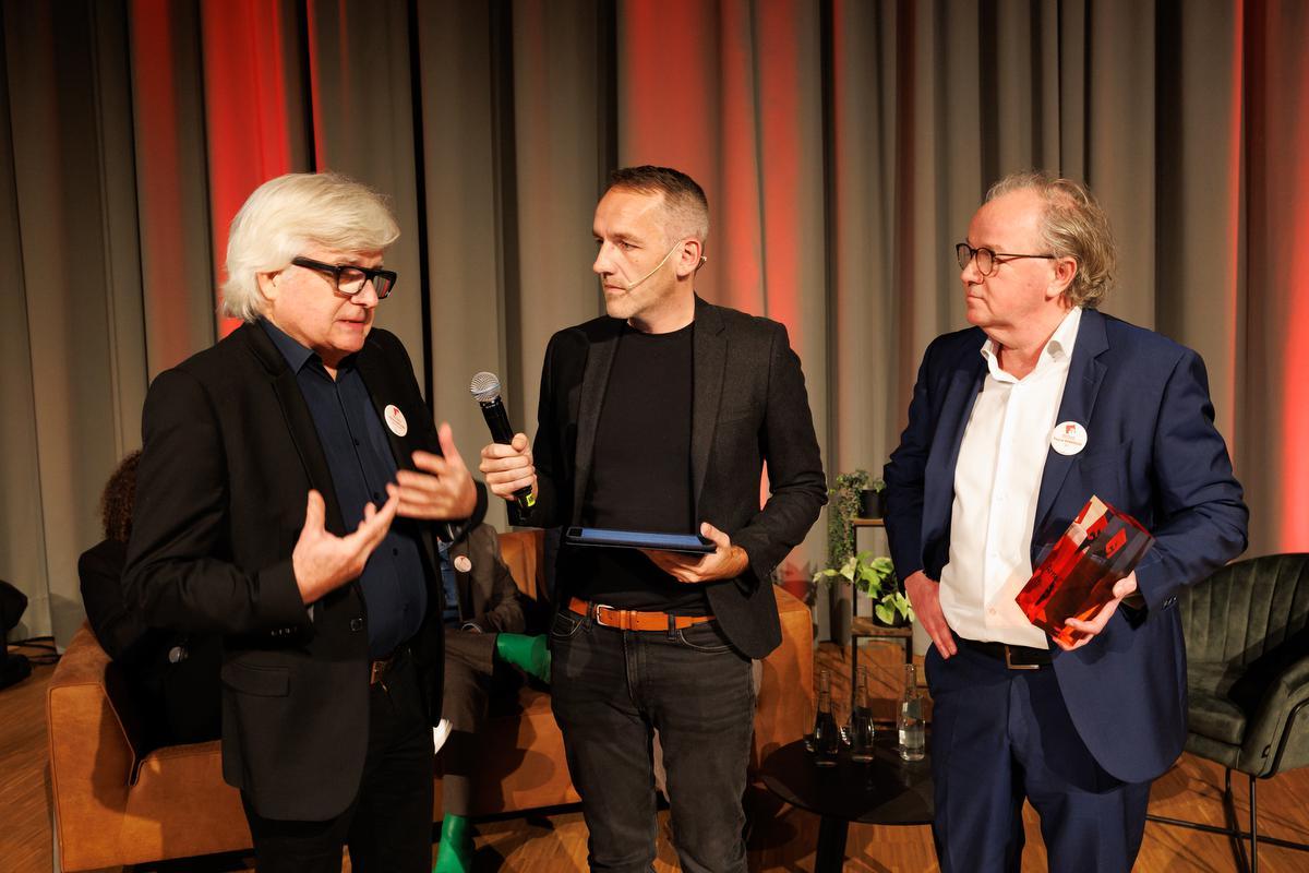 Peter Hintjens, presentator Xavier Taveirne en Pascal Kerkhove.