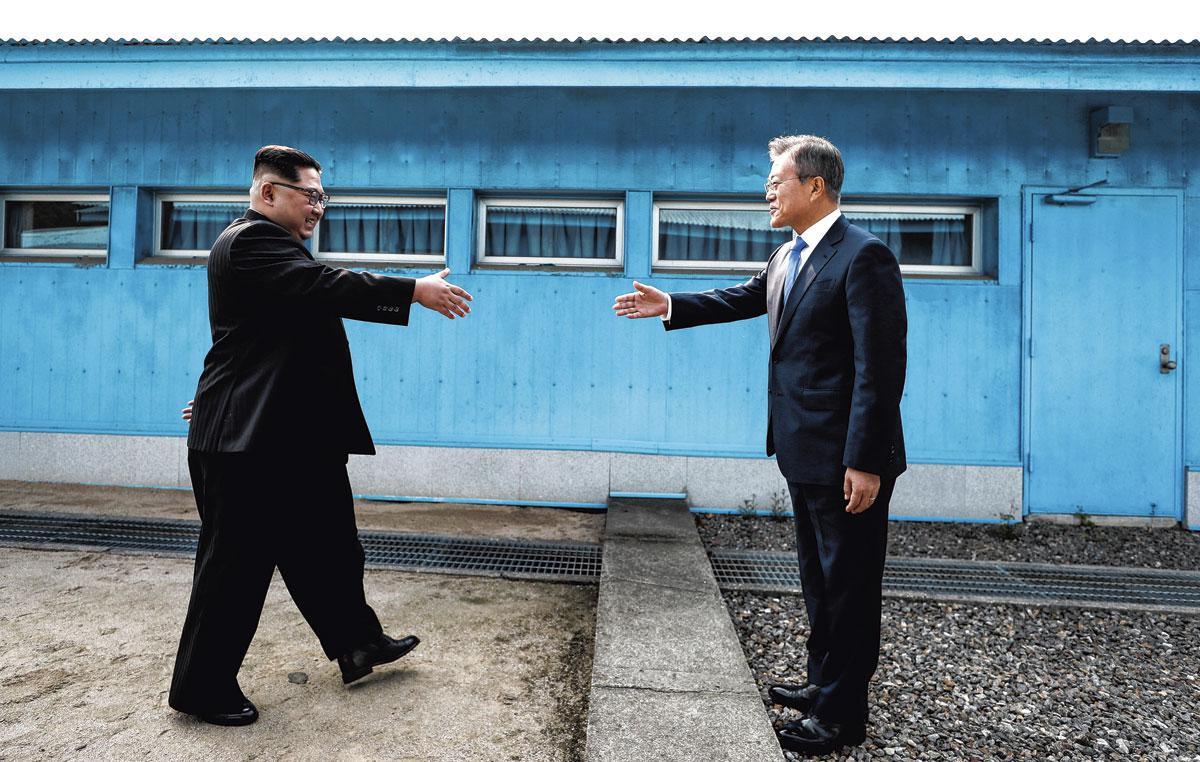 De Koreaanse presidenten Kim Jong-un en Moon Jae-in in 2018. 'Het Duitse scenario voor hereniging kunnen we beter opbergen.'