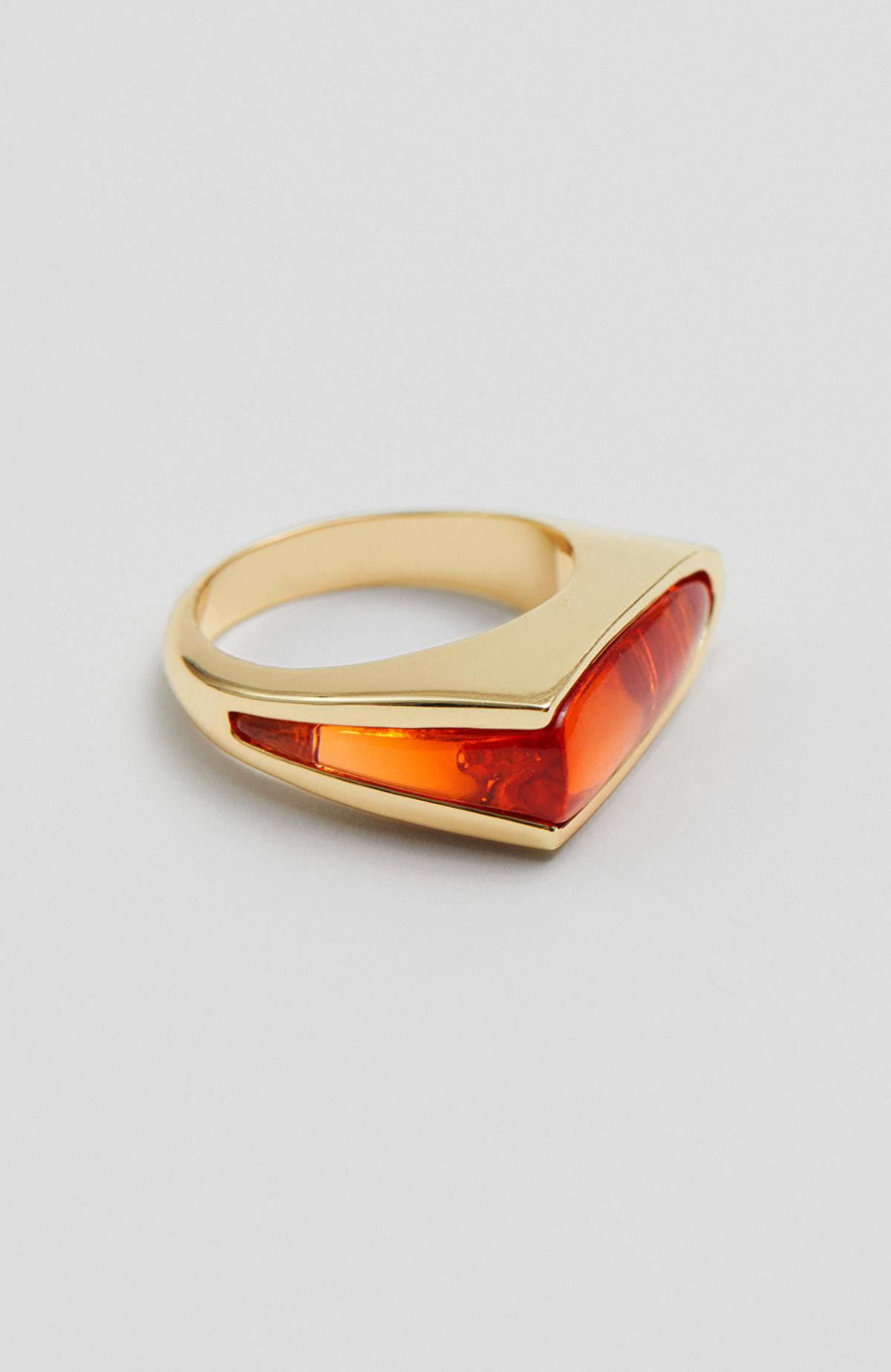 Gouden ring met oranje steentje 
