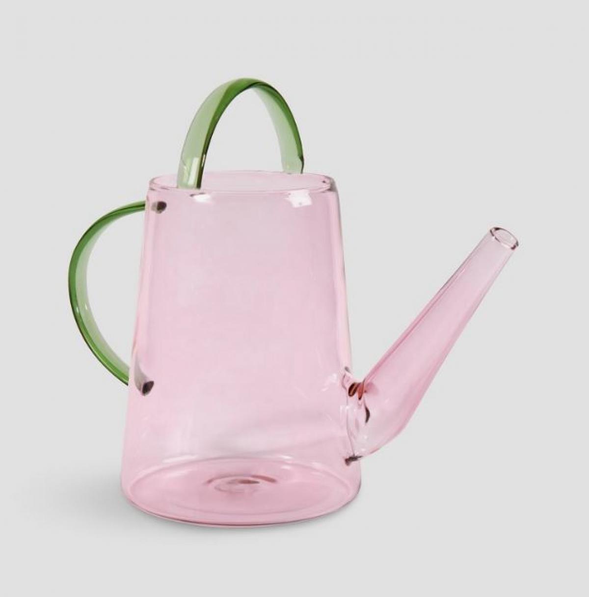 Moderne theepot in rozen en groen gekleurd glas