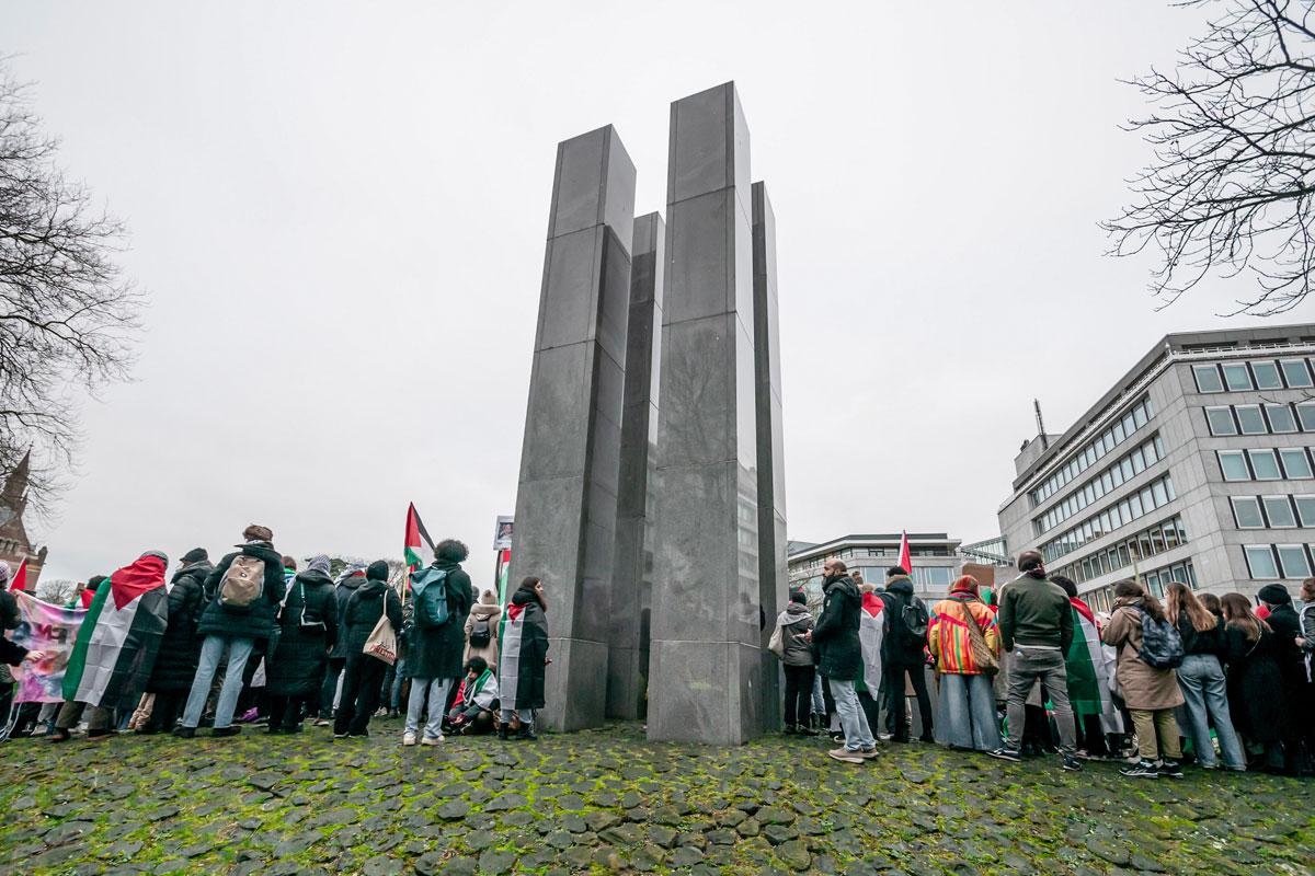 Palestinians and their supporters by the Holocaust Memorial take part during International Court of Justice (ICJ hearing).