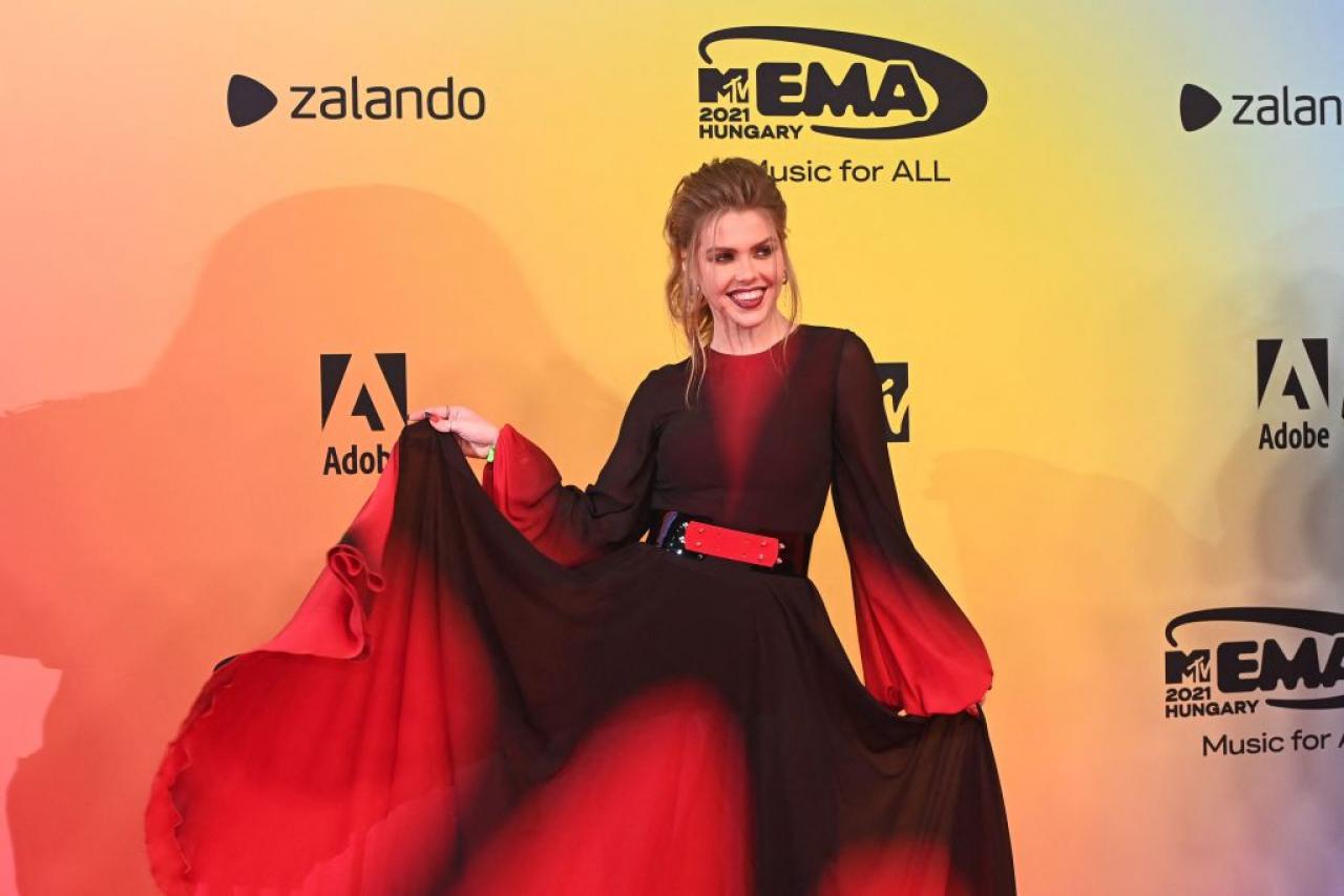 Tiktok star Jennifer Szomjas poses on the red carpet as she arrives for the MTV Europe Music Awards at the Laszlo Papp Budapest Sports Arena in Budapest, Hungary on November 14, 2021. (Photo by Attila KISBENEDEK / AFP) (Photo by ATTILA KISBENEDEK/AFP via Getty Images)