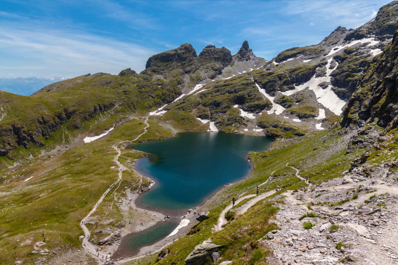 Aerial View of Schwarzsee (lake) near Pizol, on the hiking path of 5 lake hiking route, canton of St. Gallen, Switzerland