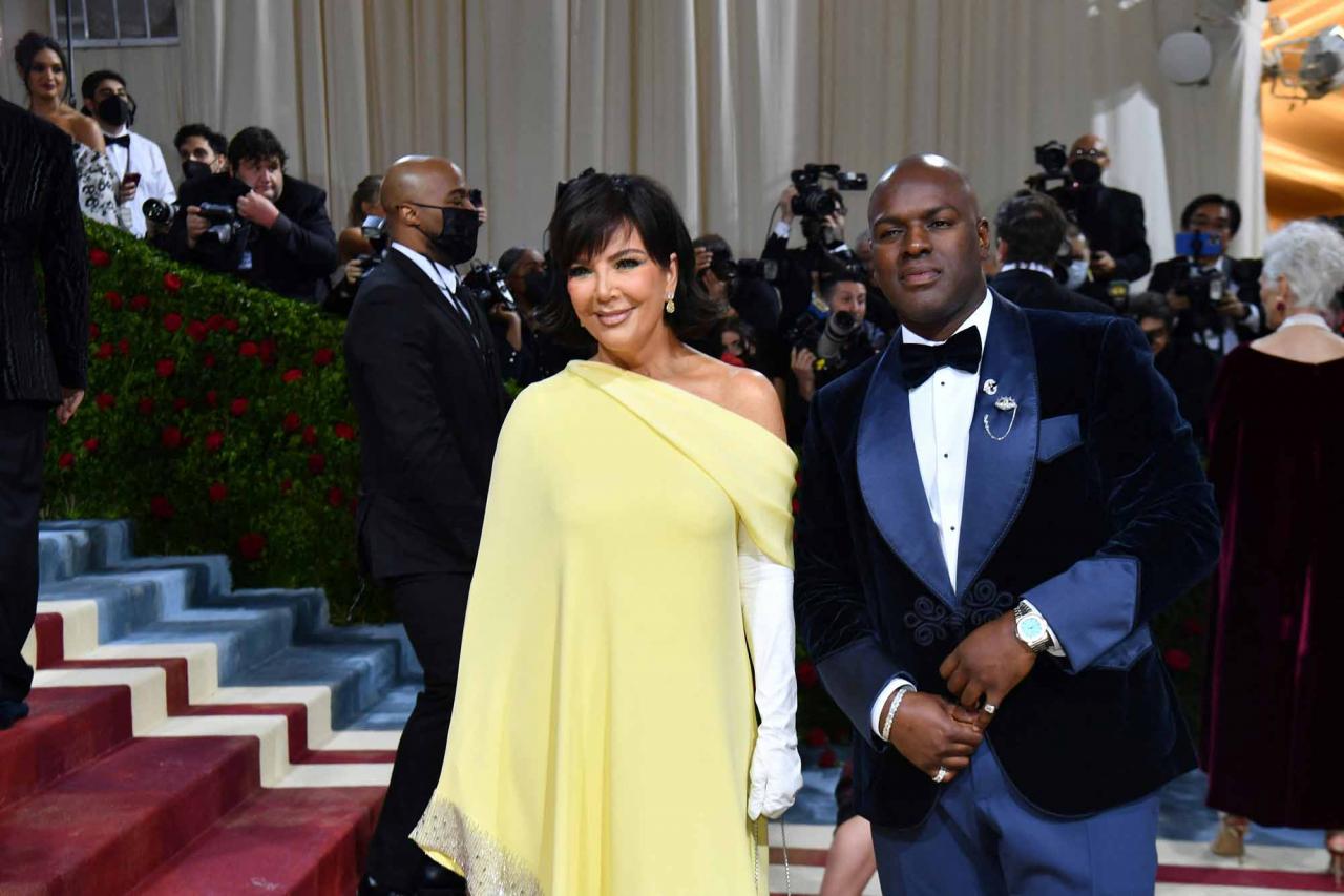 US socialite-businesswoman Kris Jenner and Corey Gamble arrive for the 2022 Met Gala at the Metropolitan Museum of Art on May 2, 2022, in New York. - The Gala raises money for the Metropolitan Museum of Art's Costume Institute. The Gala's 2022 theme is "In America: An Anthology of Fashion". (Photo by ANGELA  WEISS / AFP)