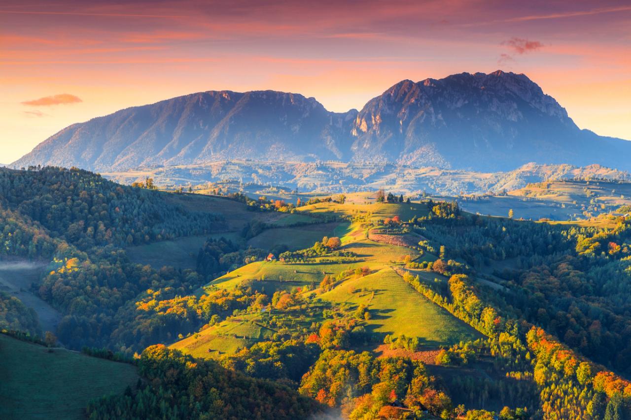 Amazing colorful sunrise with spectacular autumn landscape,Holbav,Transylvania,Romania,Europe