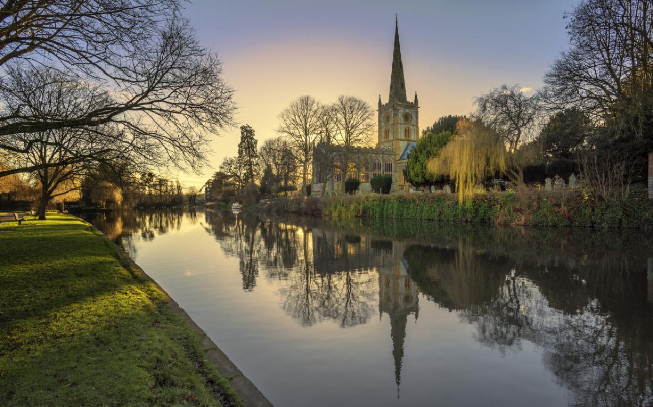 shakespeares burial place holy trinity church stratford-upon-avon  warwickshire the midlands england uk. reflections in the river avon.