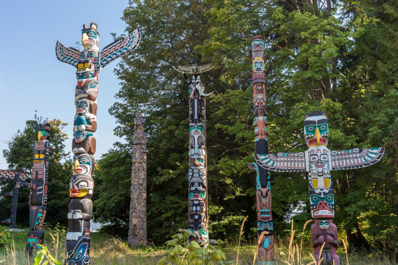 Part of the totem poles displayed at Brockton Point, Stanley Park, Vancouver, BC. These totem poles are pieces of BC First Nations artistry. Four of the original totems were from Alert Bay on Vancouver Island; additional pieces were from the Queen Charlotte Islands and rivers Inlet on the central coast of BC.Because many of the original totems were carved as early as the 1880s, they have been sent to museums for preservation. The totems at Brockton Point are new ones commissioned or loaned to the park between 1986 and 1992.