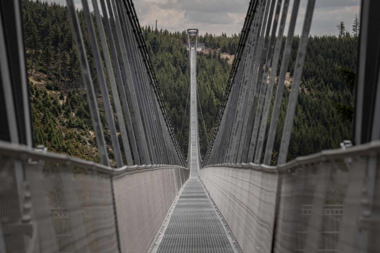 DOLNI MORAVA, CZECH REPUBLIC - MAY 9: The longest suspension pedestrian bridge in the world Sky Bridge 721 is seen in Dolni Morava, Czech Republic on May 9, 2022. Sky Bridge 721, the longest pedestrian bridge in the world with a length of 721 meters and an elevation of 95 meters above the ground, is located in the Pardubice region (a break between the Eagle Mountains and the Jesenice). (Photo by Lukas Kabon/Anadolu Agency via Getty Images)