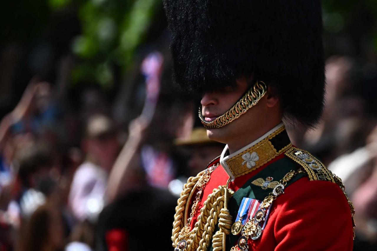 Britain's Prince William, Duke of Cambridge, in his role as Colonel of the Irish Guards, rides his horse along The Mall during the Queen's Birthday Parade, the Trooping the Colour, as part of Queen Elizabeth II's platinum jubilee celebrations, in London on June 2, 2022. - Huge crowds converged on central London in bright sunshine on Thursday for the start of four days of public events to mark Queen Elizabeth II's historic Platinum Jubilee, in what could be the last major public event of her long reign. (Photo by Ben Stansall / AFP)