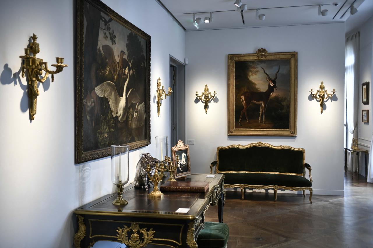 A photograph shows part of the personal collection of late French fashion designer Hubert de Givenchy displayed prior to the auction at Christie's auction house in Paris on June 8, 2022. - The interiors of the Hotel d'Orrouer and the Manoir Du Jonchet, from which the collection comes, have been recreated (14 rooms), as well as the French formal gardens of the Manoir du Jonchet. (Photo by STEPHANE DE SAKUTIN / AFP)