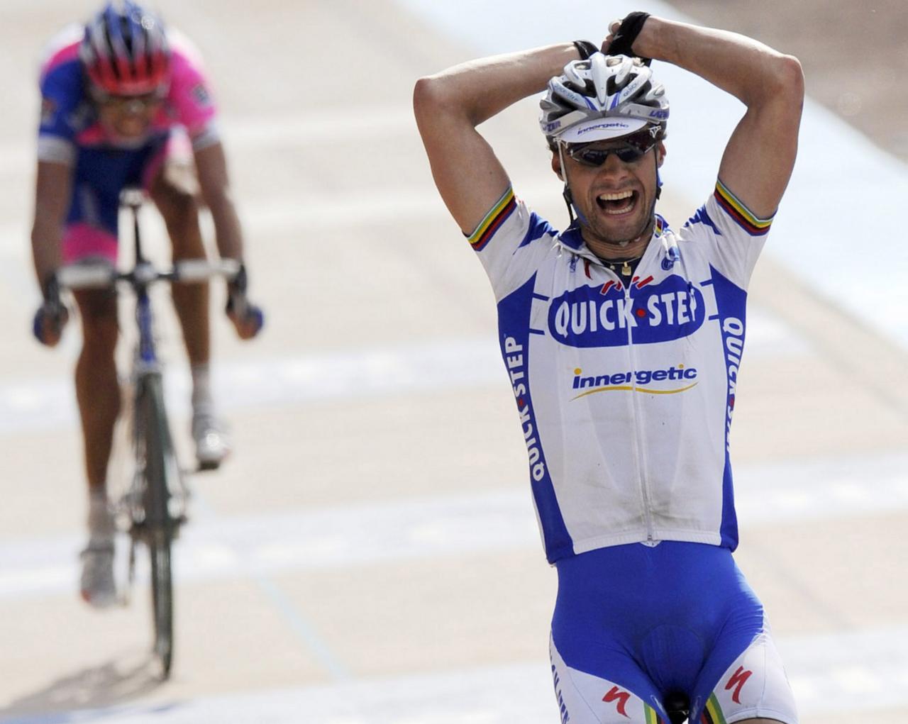 20080413- ROUBAIX, FRANCE: Winner Belgian Tom Boonen of Quick-Step celebrates ahead ahead of Italian Alessandro Ballan of Lampre (L), the 106 th edition of Paris - Roubaix cycling race (259,5 km) between Compiegne and Roubaix, Sunday 13 April 2008.
BELGA PHOTO DIRK WAEM