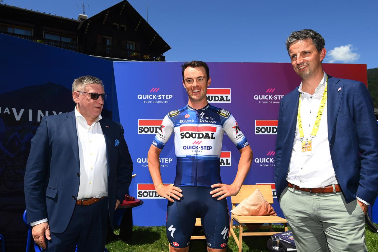 MORZINE, FRANCE - JULY 11: (L-R) Dirk Coorevits of Belgium CEO of Soudal, Yves Lampaert of Belgium and Quick-Step - Alpha Vinyl Team (with the new kit co-sponsored by Soudal brand for the 2023 season) and Ruben Desmet of Belgium President of Unilin flooring during the Quick-Step Alpha Vinyl Team - Soudal - Press Conference in the Rest Day 2 of the 109th Tour de France 2022 / #TDF2022 / #WorldTour / on July 11, 2022 in Morzine, France. (Photo by Tim de Waele/Getty Images)