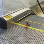 Roltrap defect door een paar Louboutins