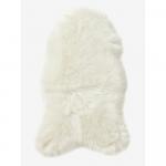 Un petit tapis tout doux en (faux) poils de mouton
