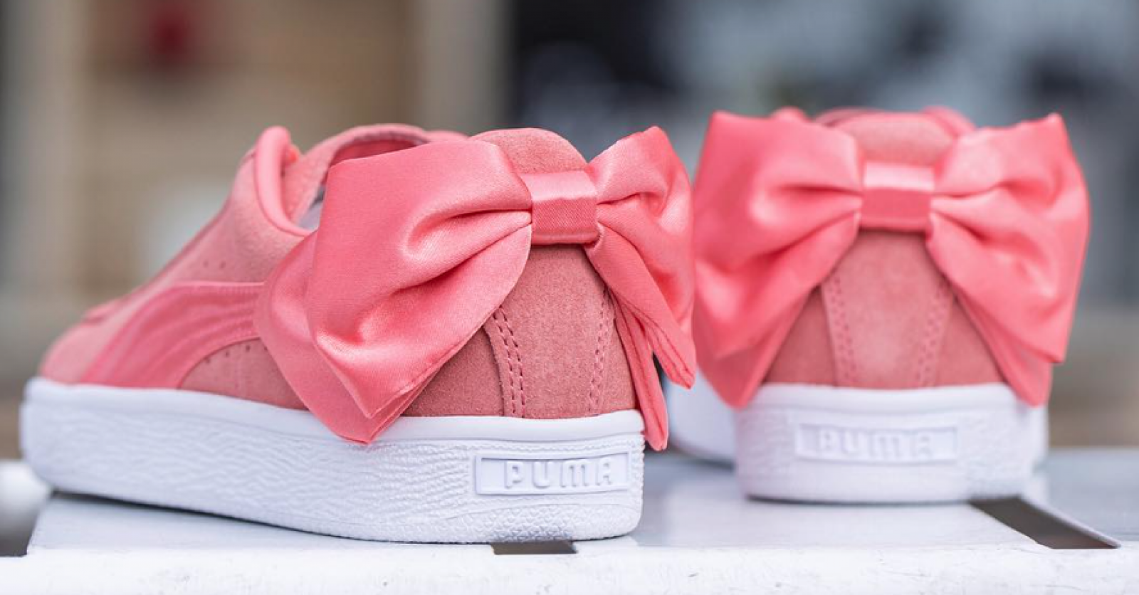 Puma rose avec noeud derriere best sale