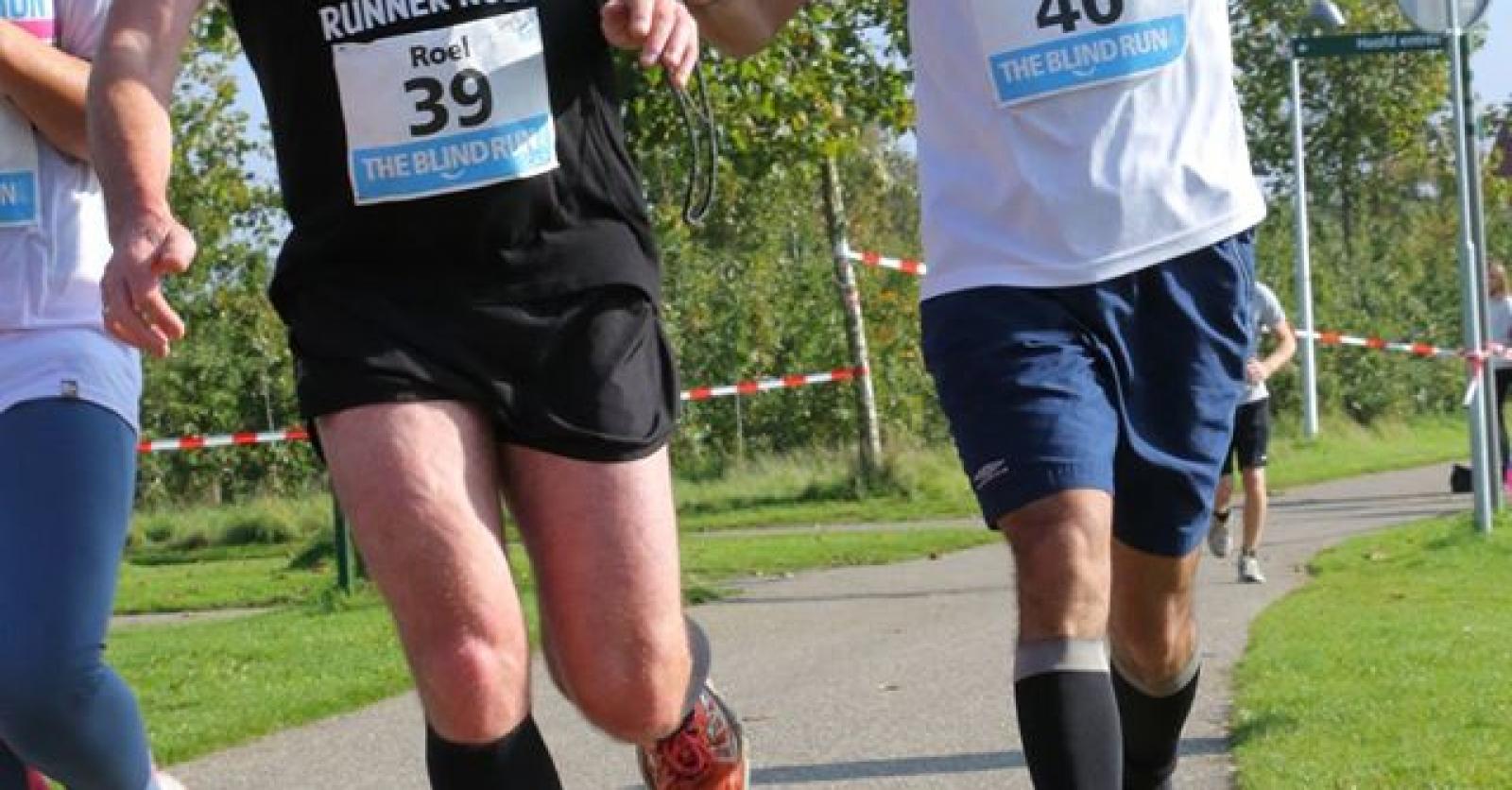 Blinde marathonloper met een grote boodschap