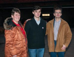 Florian Poignie samen met zijn mama Hilde en papa Ignace.