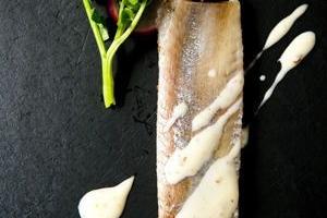 Salade van maatjes, waterkers en radijs met een dressing van appelcider