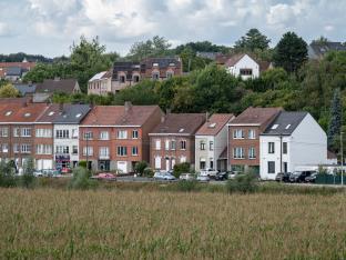 Photo de maisons illustrant la thématique du précompte immobilier