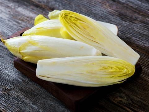 Fresh Chicory Salad  on  rustic wooden table.; Shutterstock ID 405004507