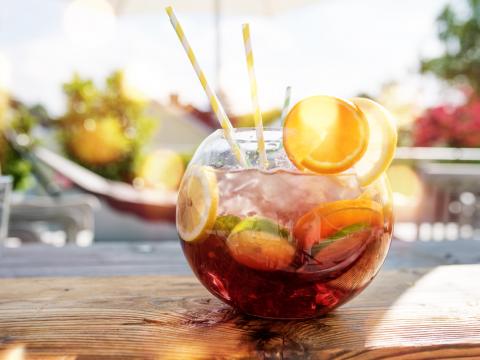 Sangria punch in a glass jar with fruits