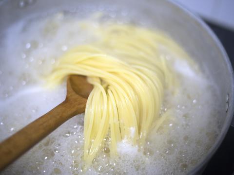 boiled water and spaghetti noodle for cooking italian pasta cuisine