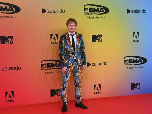 English singer-songwriter Ed Sheeran poses on the red carpet as he arrives for the MTV Europe Music Awards at the Laszlo Papp Budapest Sports Arena in Budapest, Hungary on November 14, 2021. (Photo by Attila KISBENEDEK / AFP) (Photo by ATTILA KISBENEDEK/AFP via Getty Images)