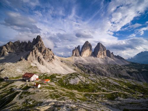 AURONZO DI CADORE, VENETO, ITALY - 2020/07/22: Panoramic aerial view on the mountain group Tre Cime di Lavaredo, with the mountain hut Dreizinnenhütte, Rifugio Locatelli and a small chapel. (Photo by Frank Bienewald/LightRocket via Getty Images)