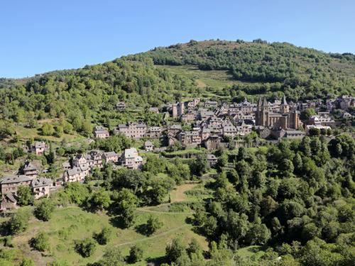 The village of Conques (south of France), in the Aveyron department, on the Way of St James (Santiago de Compostela), voie du Puy or via Podiensis pilgrimage route, France. The Abbey Church of Sainte-Foy is registered as a UNESCO World Heritage Site, Route of Santiago de Compostela in France. (Photo by: Morel J/Andia/Universal Images Group via Getty Images)