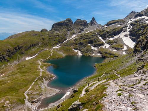 Aerial View of Schwarzsee (lake) near Pizol, on the hiking path of 5 lake hiking route, canton of St. Gallen, Switzerland