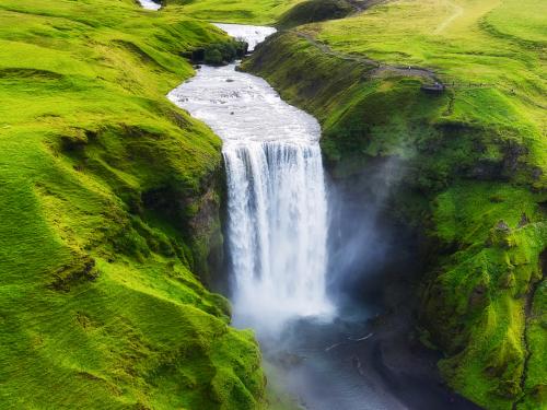 Aerial view on the Skogafoss waterfall in Iceland. Landscape from air. Famous place in Iceland. Travel - image
