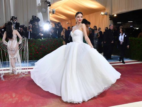 Australian model Miranda Kerr arrives for the 2022 Met Gala at the Metropolitan Museum of Art on May 2, 2022, in New York. - The Gala raises money for the Metropolitan Museum of Art's Costume Institute. The Gala's 2022 theme is "In America: An Anthology of Fashion". (Photo by ANGELA  WEISS / AFP)