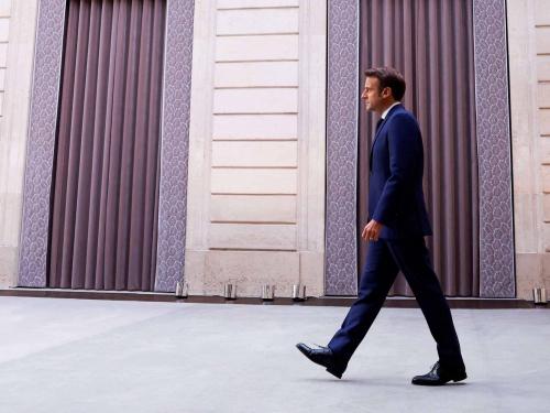 French President Emmanuel Macron arrives at the Elysee presidential palace in Paris on May 7, 2022, to attend his investiture ceremony as French President, following his re-election last April 24. (Photo by GONZALO FUENTES / POOL / AFP)