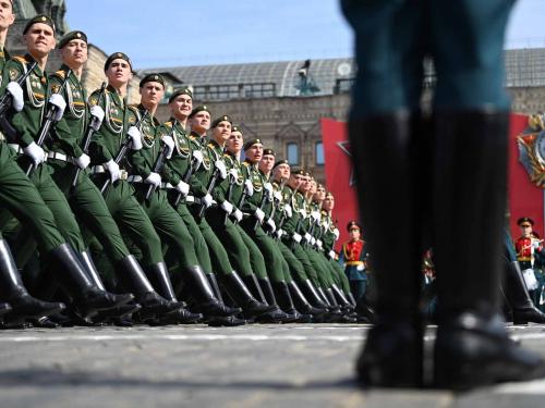 Russian servicemen march on Red Square during the general rehearsal of the Victory Day military parade in central Moscow on May 7, 2022. - Russia will celebrate the 77th anniversary of the 1945 victory over Nazi Germany on May 9. (Photo by Kirill KUDRYAVTSEV / AFP)