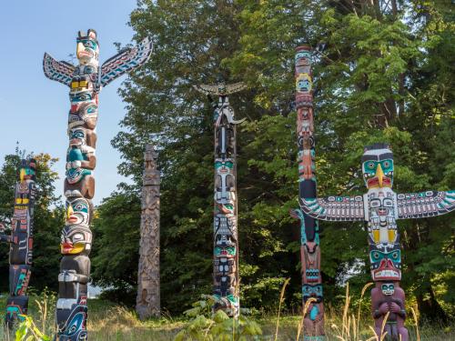 Part of the totem poles displayed at Brockton Point, Stanley Park, Vancouver, BC. These totem poles are pieces of BC First Nations artistry. Four of the original totems were from Alert Bay on Vancouver Island; additional pieces were from the Queen Charlotte Islands and rivers Inlet on the central coast of BC.Because many of the original totems were carved as early as the 1880s, they have been sent to museums for preservation. The totems at Brockton Point are new ones commissioned or loaned to the park between 1986 and 1992.