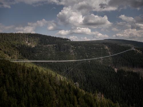 DOLNI MORAVA, CZECH REPUBLIC - MAY 9: The longest suspension pedestrian bridge in the world Sky Bridge 721 is seen in Dolni Morava, Czech Republic on May 9, 2022. Sky Bridge 721, the longest pedestrian bridge in the world with a length of 721 meters and an elevation of 95 meters above the ground, is located in the Pardubice region (a break between the Eagle Mountains and the Jesenice). (Photo by Lukas Kabon/Anadolu Agency via Getty Images)