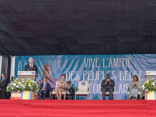 Belgium's King Philippe (L) addresses dignitaries and members of the public at the National Assembly in Kinshasa on June 8, 2022 as Belgium Prime Minister Alexandre De Croo (2nd L) Belgium Queen Mathilde (3rd L) and Democratic Republic of the Congo President Felix Tshisekedi (R) look on. - Belgium's King Philippe, in a historic visit to DR Congo, said on June 8, 2022 that his country's rule over the vast central African country had inflicted pain and humiliation through a mixture of "paternalism, discrimination and racism."
In a speech outside the Democratic Republic of Congo's parliament, Philippe amplified remorse he first voiced two years ago over Belgium's brutal colonial rule -- an era that historians say saw millions die. (Photo by Arsene Mpiana / AFP)