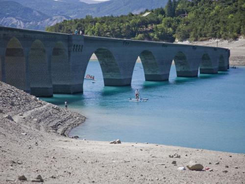 View of the Moulettes viaduct which is normally underwater,S erre-Poncon, France on August 02, 2022. The lake of Serre-poncon suffers from drought, it lacks 13 meters at its usual level at the same time. Photo by Thibaut Durand /ABACAPRESS.COM