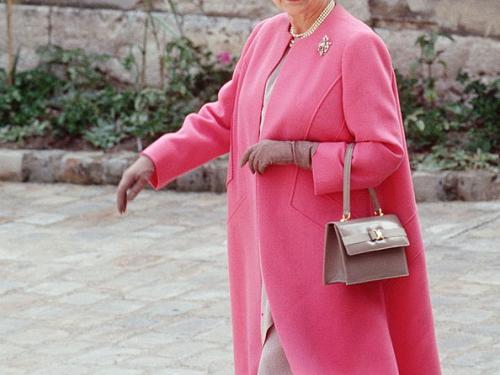 BLOIS, FRANCE - JUNE 11:  The Queen On A Visit To Blois In France Wearing A Pink And Taupe Outfit Designed By Fashion Designer Ian Thomas With Colour Co-ordinated Taupe Shoes And Accessories  (Photo by Tim Graham Photo Library via Getty Images)