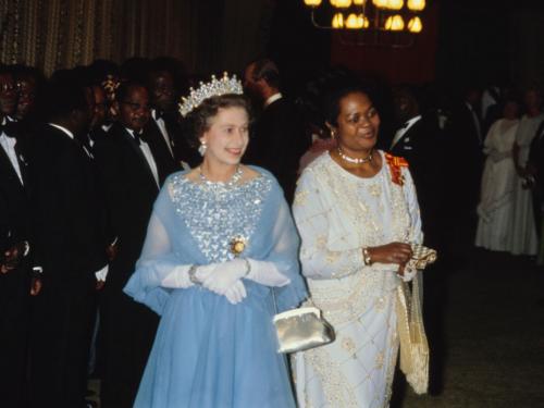 British Royal Queen Elizabeth ll, wearing a blue evening dress, white evening gloves and the wearing the Girls of Great Britain and Ireland Tiara, with Cecilia Kadzamira during a State Banquet in Malawi, 3rd July 1979. The Queen is on a three-day State Visit to Malawi. (Photo by Serge Lemoine/Hulton Archive/Getty Images)