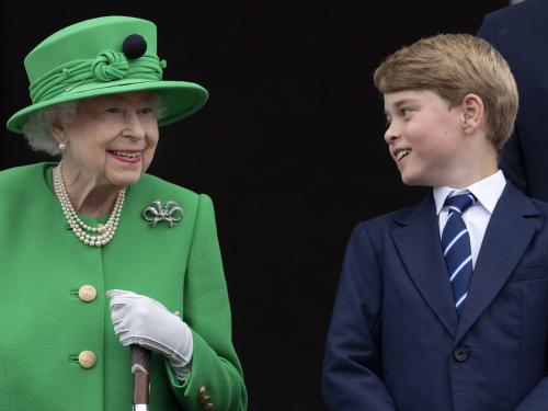 LONDON, ENGLAND - JUNE 05: Queen Elizabeth II and Prince George of Cambridge stand on the balcony at Buckingham Palace at the end of the Platinum Pageant on The Mall on June 5, 2022 in London, England. The Platinum Jubilee of Elizabeth II is being celebrated from June 2 to June 5, 2022, in the UK and Commonwealth to mark the 70th anniversary of the accession of Queen Elizabeth II on 6 February 1952. (Photo by Mark Cuthbert/UK Press via Getty Images)