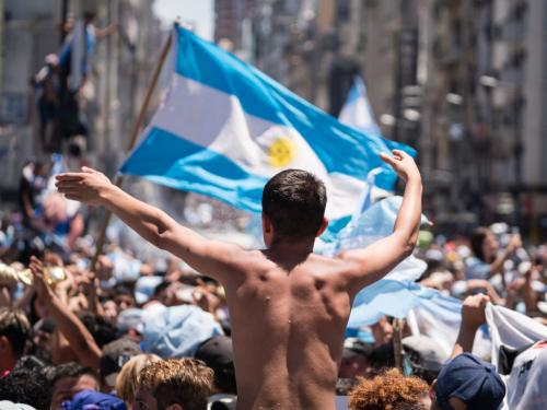 BUENOS AIRES - ARGENTINA, DECEMBER 20: Argentinians celebrating their nationâs third World Cup victory, in the capital Buenos Aires, Argentina on December 20, 2022. On Sunday, Messi-led Argentina beat France 4-2 on penalties in Qatar to bag the nation's third FIFA World Cup title. The Argentine national team was expected to tour the streets of the city by bus, but the number of people in the streets exceeded expectations and made it impossible for the team to arrive, which had to be evacuated by helicopter without completing the tour. (Photo by Diego Radames/Anadolu Agency via Getty Images)