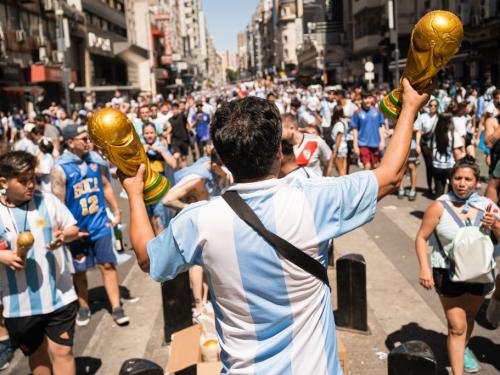 BUENOS AIRES - ARGENTINA, DECEMBER 20: Argentinians celebrating their nationâs third World Cup victory, in the capital Buenos Aires, Argentina on December 20, 2022. On Sunday, Messi-led Argentina beat France 4-2 on penalties in Qatar to bag the nation's third FIFA World Cup title. The Argentine national team was expected to tour the streets of the city by bus, but the number of people in the streets exceeded expectations and made it impossible for the team to arrive, which had to be evacuated by helicopter without completing the tour. (Photo by Diego Radames/Anadolu Agency via Getty Images)