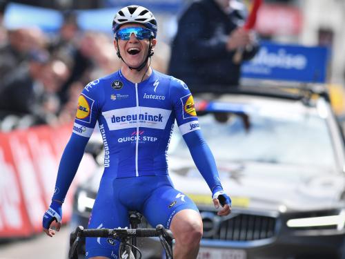 Belgian Remco Evenepoel of Deceuninck - Quick-Step celebrates as he crosses the finish line to win the second stage of the Baloise Belgium Tour cycling race, 180,8km from Knokke-Heist to Zottegem, Thursday 13 June 2019. BELGA PHOTO DAVID STOCKMAN (Photo credit should read DAVID STOCKMAN/AFP via Getty Images)