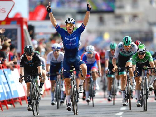 LA MANGA, SPAIN - AUGUST 21: Fabio Jakobsen of Netherlands and Team Deceuninck - Quick-Step celebrates winning ahead of Alberto Dainese of Italy and Team DSM and Jasper Philipsen of Belgium and Team Alpecin-Fenix green points jersey during the 76th Tour of Spain 2021, Stage 8 a 173,7 km stage from Santa Pola to La Manga del Mar Menor / @lavuelta / #LaVuelta21 / on August 21, 2021 in La Manga, Spain. (Photo by Stuart Franklin/Getty Images)
