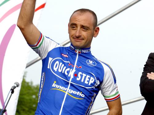 20060504 - LIEGE, BELGIUM : Italian Paolo Bettini of Quick Step during the official presentation of the teams taking part in the Tour of Italy cycling race, Thursday 04 May 2006, in Liege. The prologue of the Giro d'Italia is scheduled on Saturday 06. BELGA PHOTO MICHEL KRAKOWSKI-AFP