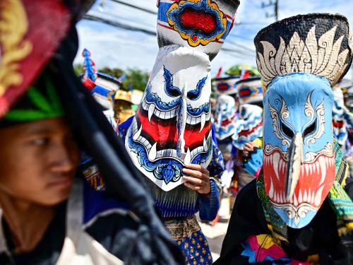 Participants wearing ghost masks and colorful costumes take part in the annual Phi Ta Khon carnival or ghost festival in Dan Sai district in northeastern Thailands Loei Province on June 24, 2023. (Photo by MANAN VATSYAYANA / AFP)
