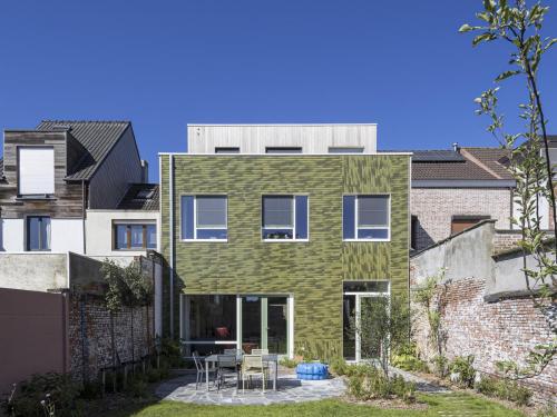 Het huis is letterlijk en figuurlijk groen.